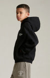 Black Fear of God Essentials Kids fleece hoodie with front pocket and hood, made by THE EA STORE.