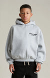 Kids Fear of God Essentials fleece hoodie in dark oatmeal, featuring soft fabric and casual fit, from THE EA STORE.