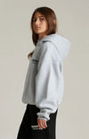 Kids fleece hoodie in dark oatmeal from Fear of God Essentials, featuring a cozy, soft fabric and stylish casual design.