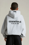 Kids Fear of God Essentials fleece hoodie in dark oatmeal, soft and cozy, featuring the Essentials logo and a comfortable fit.