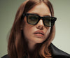 Ray-Ban Meta Wayfarer Gen 2 shiny black smart glasses with clear and green transition lenses, designed by THE EA STORE.
