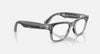 Ray-Ban Meta Wayfarer Gen 2 shiny transparent grey smart glasses with clear sapphire transitions lenses, showcasing sleek design.