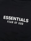 Black Fear of God Essentials Kids fleece hoodie featuring a cozy, soft fabric with the Essentials logo for comfortable everyday wear.