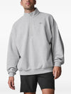 Alo Yoga men's and women's heather grey quarter-zip fleece sweatshirt with a half-zip collar and cozy pullover design.