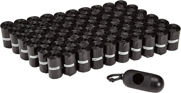 Disposable dog poop bags with leak proof design, unscented, including dispenser and leash clip holder.