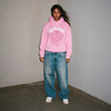 Pink Sp5der Web Hoodie by THE EA STORE, featuring a bold web design, long sleeves, and a casual streetwear style.
