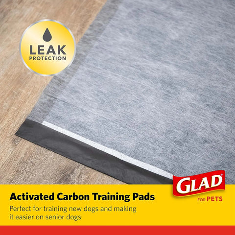 Glad charcoal puppy pads showing absorbent layers for dog pee and odor control.