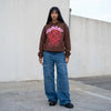 Brown and pink Sp5der Web hoodie by THE EA STORE, featuring a streetwear pullover design with bold web graphic.