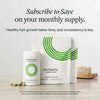 Nutrafol hair growth supplement with packaging on a light background