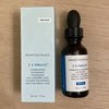 SkinCeuticals C E Ferulic skincare product with packaging on a wooden surface