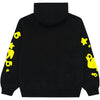 Black and yellow Sp5der Essential hoodie featuring star graphics, inspired by Young Thug streetwear style.