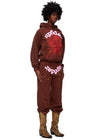 Sp5der brown and pink web hoodie from THE EA STORE, authentic Young Thug streetwear pullover with web design and logo details.