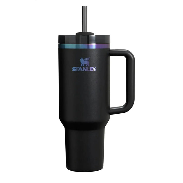 Black Color Stanley 40 oz Quencher Tumbler on a desk beside an iced coffee, perfect for daily hydration.