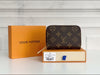 Louis Vuitton Monogram Zippy Coin Purse in leather, compact zipper wallet with monogram pattern featuring gold-tone hardware.