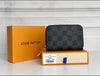 Louis Vuitton Damier Graphite Zippy Coin Purse in leather, compact zip wallet with designer pattern and structured design.