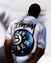 White Stussy x Born X Raised 8 Ball T-shirt from THE EA STORE, featuring a bold graphic design on the front.