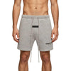 Essentials Fear of God Sweat Shorts in dark oatmeal, cozy cotton blend with elastic waistband and relaxed fit.