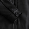 Men's black genuine leather rider jacket with classic collar and zip closure, stylish and durable for everyday wear.