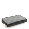 Louis Vuitton Damier Graphite Zippy Coin Purse in leather, compact zip wallet with checkered pattern and gold-tone zipper.