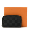 Louis Vuitton Damier Graphite leather Zippy coin purse with compact zip wallet design for men, featuring designer craftsmanship.