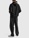 Stüssy Black Hooded Sweatshirt – Minimalist Pullover with Signature Hood Logo