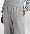 Alo Yoga unisex Accolade straight leg fleece sweatpants in Heather Grey, showcasing relaxed fit and soft fleece fabric.