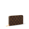 Louis Vuitton Monogram Zippy Wallet Set in leather, featuring a zip-around design and multiple card slots, side view.