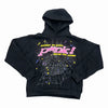 Black Sp5der Essential hoodie featuring pink and white graphic print, casual streetwear pullover with a bold design.