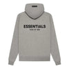 Dark oatmeal Fear of God Essentials hoodie from THE EA STORE, featuring a soft fabric and relaxed fit in a casual style.