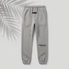Essentials Fear of God Relaxed Sweatpants in Dark Oatmeal, soft cotton joggers with a relaxed fit and elastic waistband.