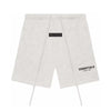 Light oatmeal Fear of God Essentials sweat shorts from THE EA STORE, featuring a comfortable, casual fit and soft fabric.