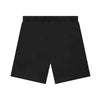 Fear of God Essentials stretch sweat shorts in Limo color, shown in a close-up image highlighting the soft fabric and relaxed fit.