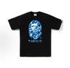Black and blue camo BAPE ABC Camo Ape Head Tee from THE EA STORE, featuring the iconic ape head logo on the front.