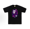 Black and purple BAPE ABC Camo Ape Head Tee from THE EA STORE, showcasing the iconic camo pattern and ape head logo.