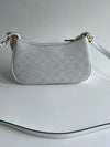 Coach Teri 2-Way Shoulder Bag in Signature coated canvas with white color, featuring dual straps and classic design.