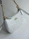 Coach Teri 2-Way Shoulder Bag in signature coated canvas, white with leather accents, stylish and versatile for everyday use.