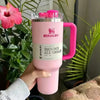 Stanley 40 oz Quencher H2.0 insulated tumbler with handle, leak-resistant FlowState lid, soft pink and fuchsia design for reusable water drinking