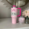 Stanley Quencher H2.0 FlowState 40oz tumbler in Flamingo Barbie Pink, featuring a sleek stainless steel design and durable construction.