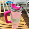 Stanley Quencher H2.0 FlowState 40oz tumbler in Flamingo Barbie Pink, featuring a sleek design and durable stainless steel construction.
