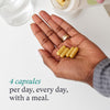 Nutrafol Women's Daily Hair Growth Capsules by THE EA STORE, showing four capsules in a clear bottle for healthy hair support.