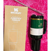 Stanley Wicked x Target 40oz Elphaba H2.0 FlowState water bottle with packaging on pink textured background