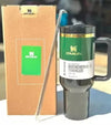 Stanley Wicked x Target 40oz Elphaba H2.0 FlowState water bottle by THE EA STORE with packaging on a blurred background.