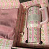 Floral-patterned Stanley x Love Shack Fancy 40oz Quencher Tumbler in a decorative box with pink interior, spill-proof stainless steel water bottle.