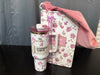 Stanley x Love Shack Fancy 40oz Ribbon Rosa FlowState H2.0 stainless steel spill-proof water bottle with floral pink and white design.