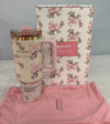 Stanley x Love Shack Fancy stainless steel water bottle in gift box, featuring a stylish design and durable construction.