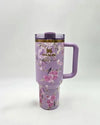 Stanley x LoveShackFancy floral-patterned 40oz water bottle with Rosa Beaux Purple design on a white background