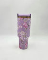 Stanley x LoveShackFancy "Happy Thoughts" 40oz floral water bottle with Rosa Beaux Purple design on a white background